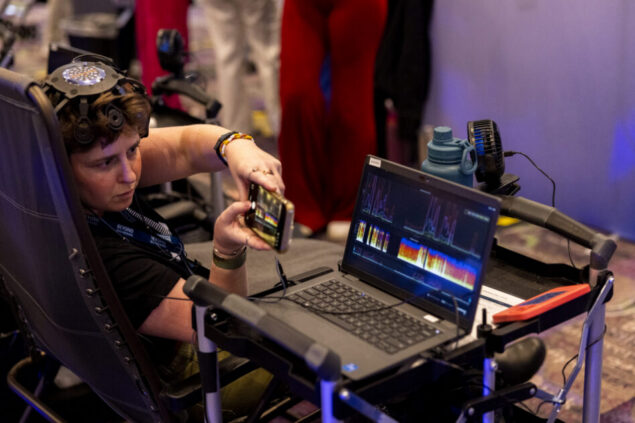 Attendee looking at data